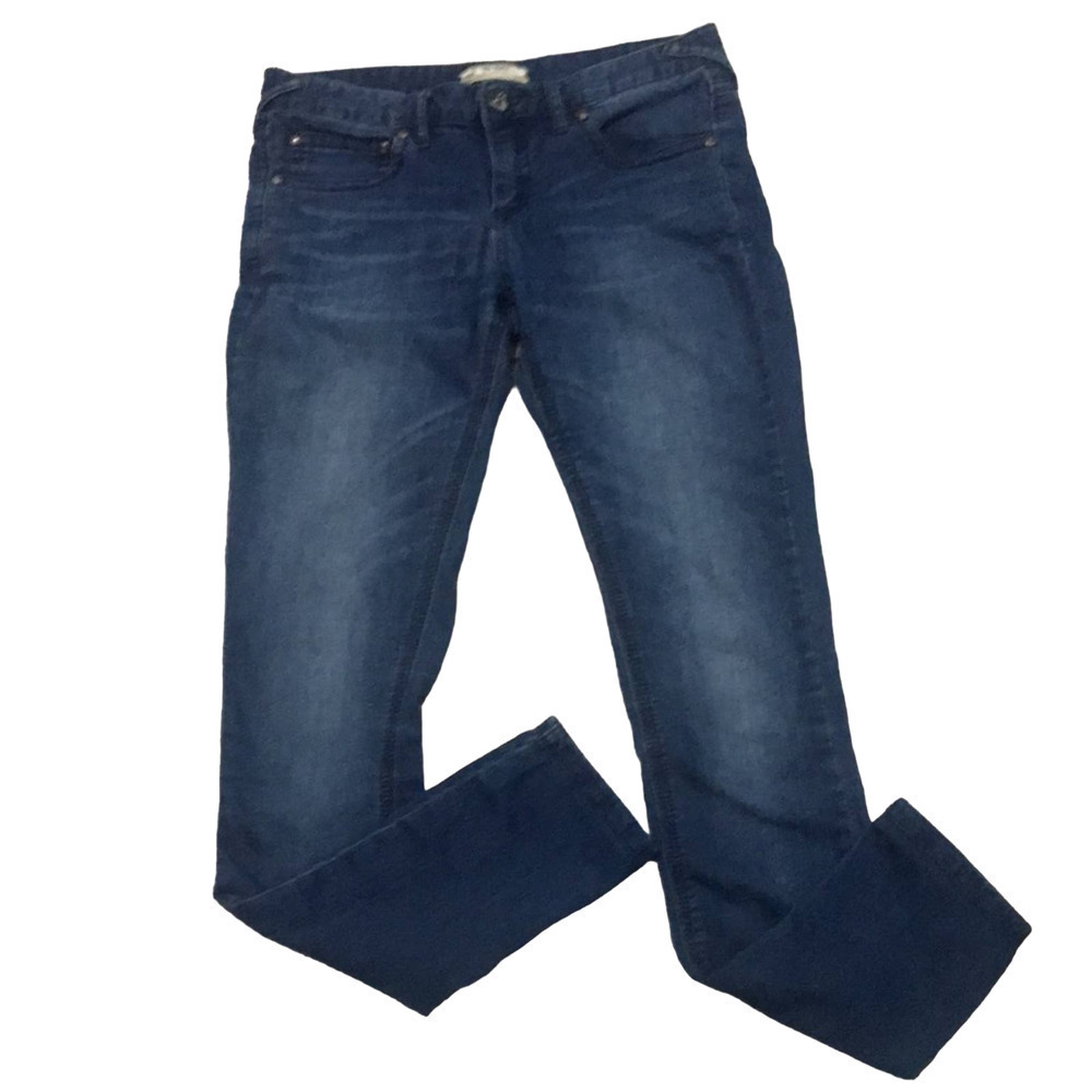 Free People mid-rise skinny Medium Wash with intensional fading, wiskering sz 28